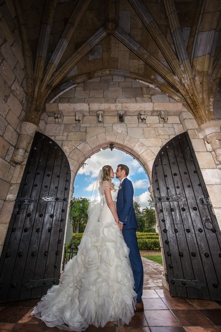 Newly married couple at Monastery entrance gates.