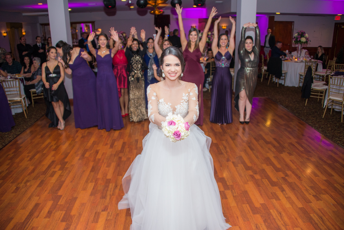 bride groom wedding throwing flower bouquet