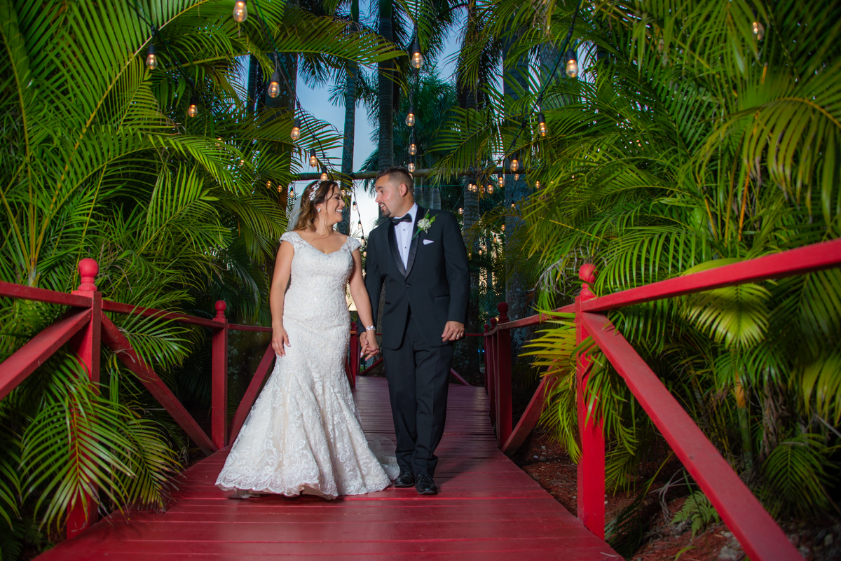 bride groom wedding walking holdings hands